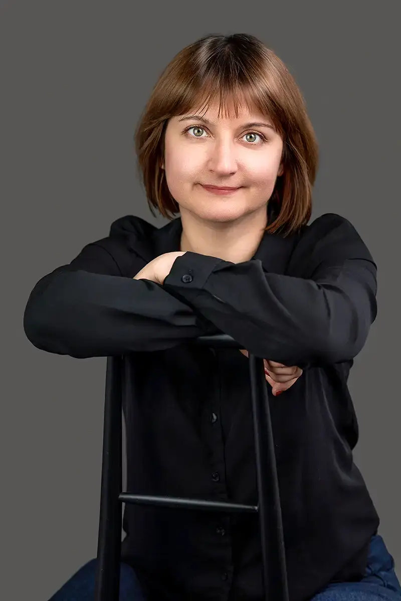 Female manager in black outfit — corporate portrait taken at Chaplin Studio