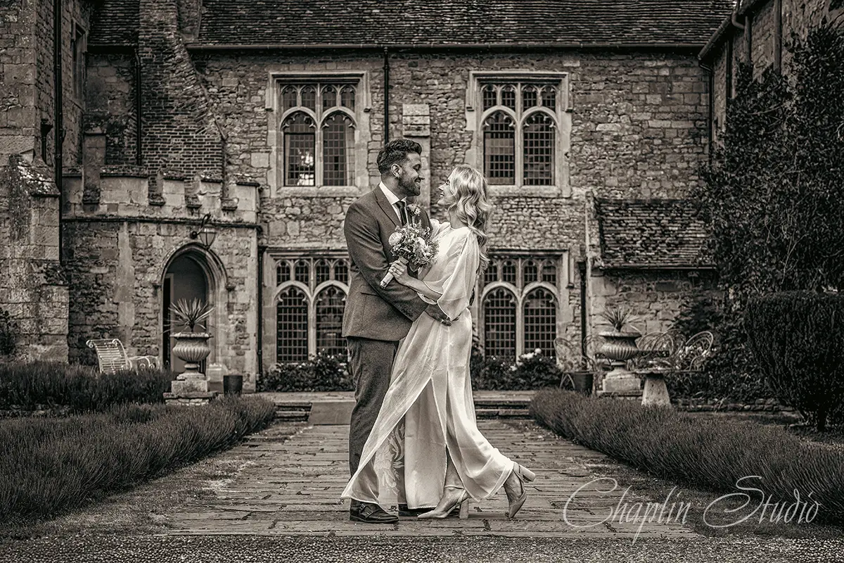 Elegant wedding couple portrait at a historic Yorkshire manor by Chaplin Studio.