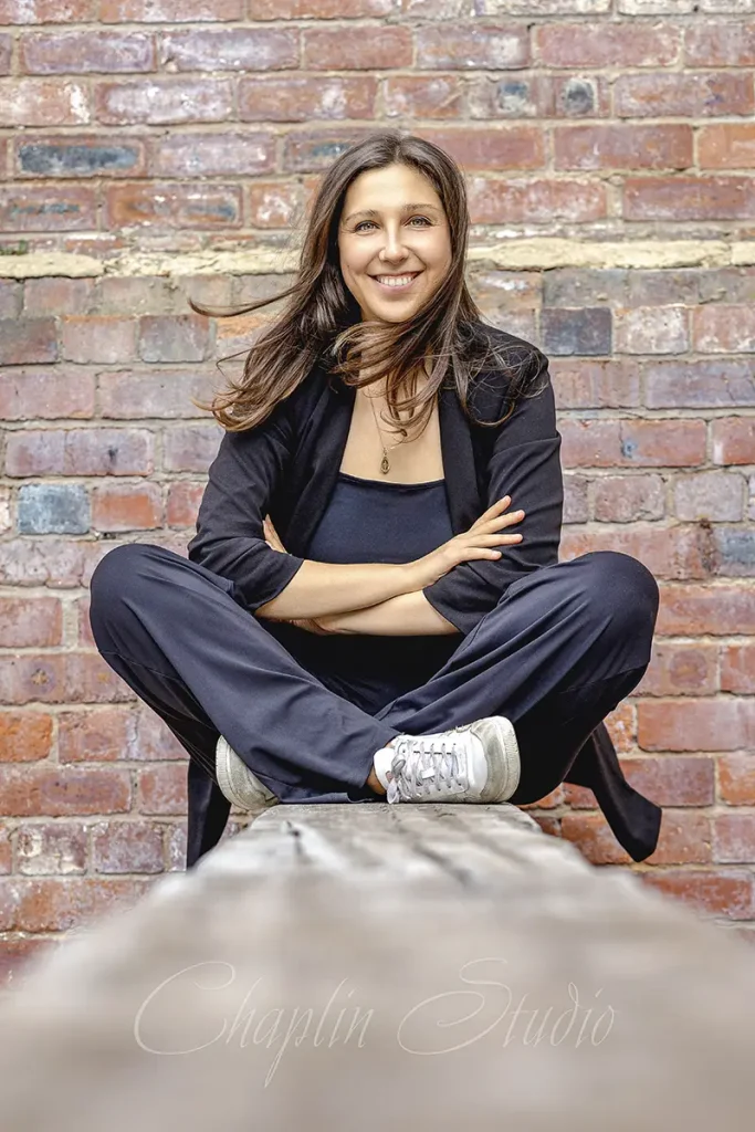 rofessional headshot of a smiling woman in Halifax, UK. Business portrait photography by Chaplin Studio.